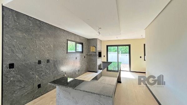 Casa em Porto Alegre, no bairro Hípica, com 3 dormitório(s), e 3 banheiros, à venda.