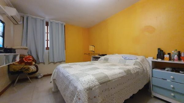 Casa em Porto Alegre, no bairro Espírito Santo, com 4 dormitório(s), e 4 banheiros, à venda.