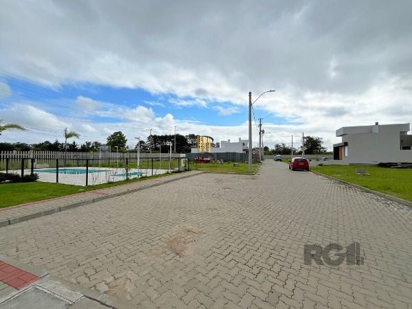 Casa Condominio em Porto Alegre, no bairro Hípica, com 3 dormitório(s), e 3 banheiros, à venda.