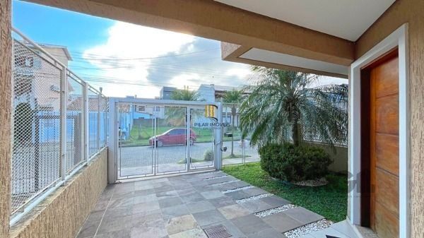 Casa em Porto Alegre, no bairro Hípica, com 3 dormitório(s), e 3 banheiros, à venda.