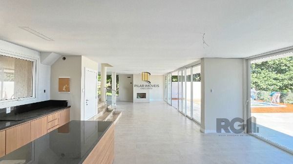 Casa Condominio em Porto Alegre, no bairro Hípica, com 3 dormitório(s), e 3 banheiros, à venda.