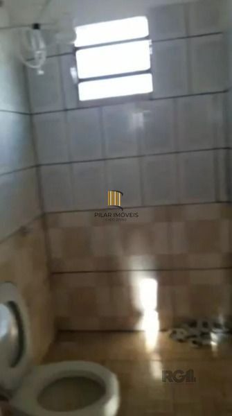 Casa em Porto Alegre, no bairro Hípica, com 2 dormitório(s), e 2 banheiros, à venda.