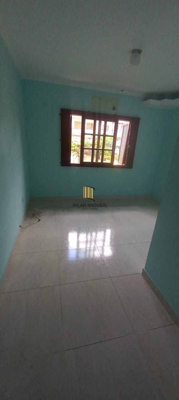 Casa 3 dormitórios no bairro Guarujá