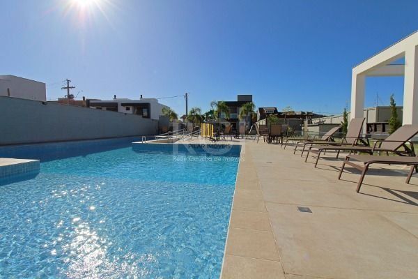 Casa Condominio em Porto Alegre, no bairro Ipanema, com 3 dormitório(s), à venda.