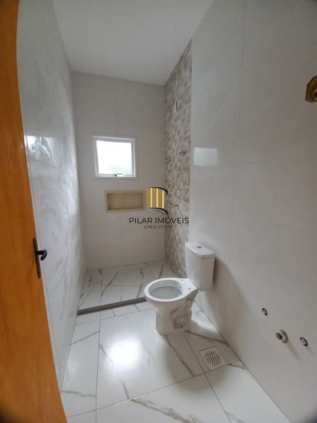 Casa em Porto Alegre, no bairro Belém Novo, com 3 dormitório(s), e 3 banheiros, à venda.