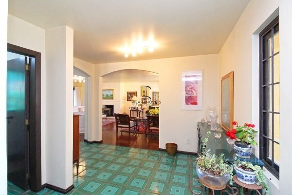 Casa Condominio em Porto Alegre, no bairro Cavalhada, com 4 dormitório(s), e 4 banheiros, à venda.
