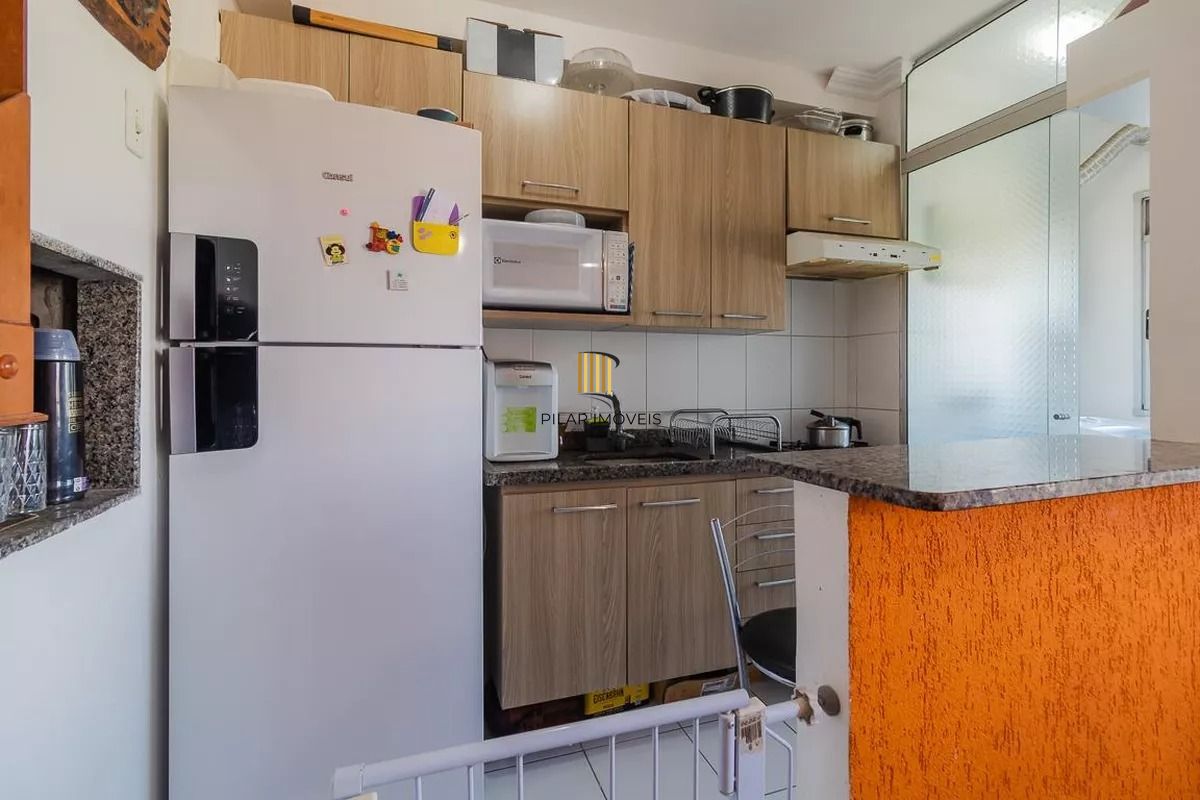 Apartamento 2 dormitórios, com suíte, churrasqueira, e vaga escriturada.