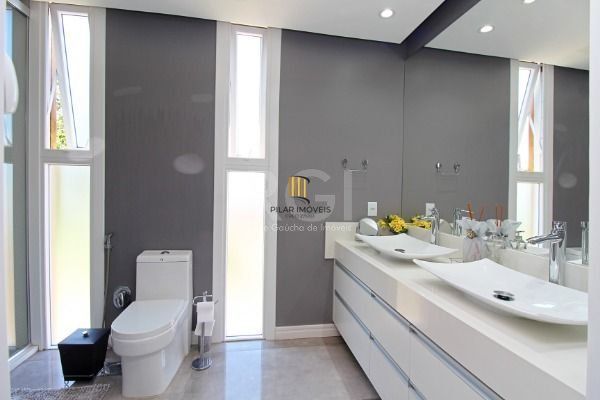 Casa Condominio em Porto Alegre, no bairro Hípica, com 3 dormitório(s), e 3 banheiros, à venda.