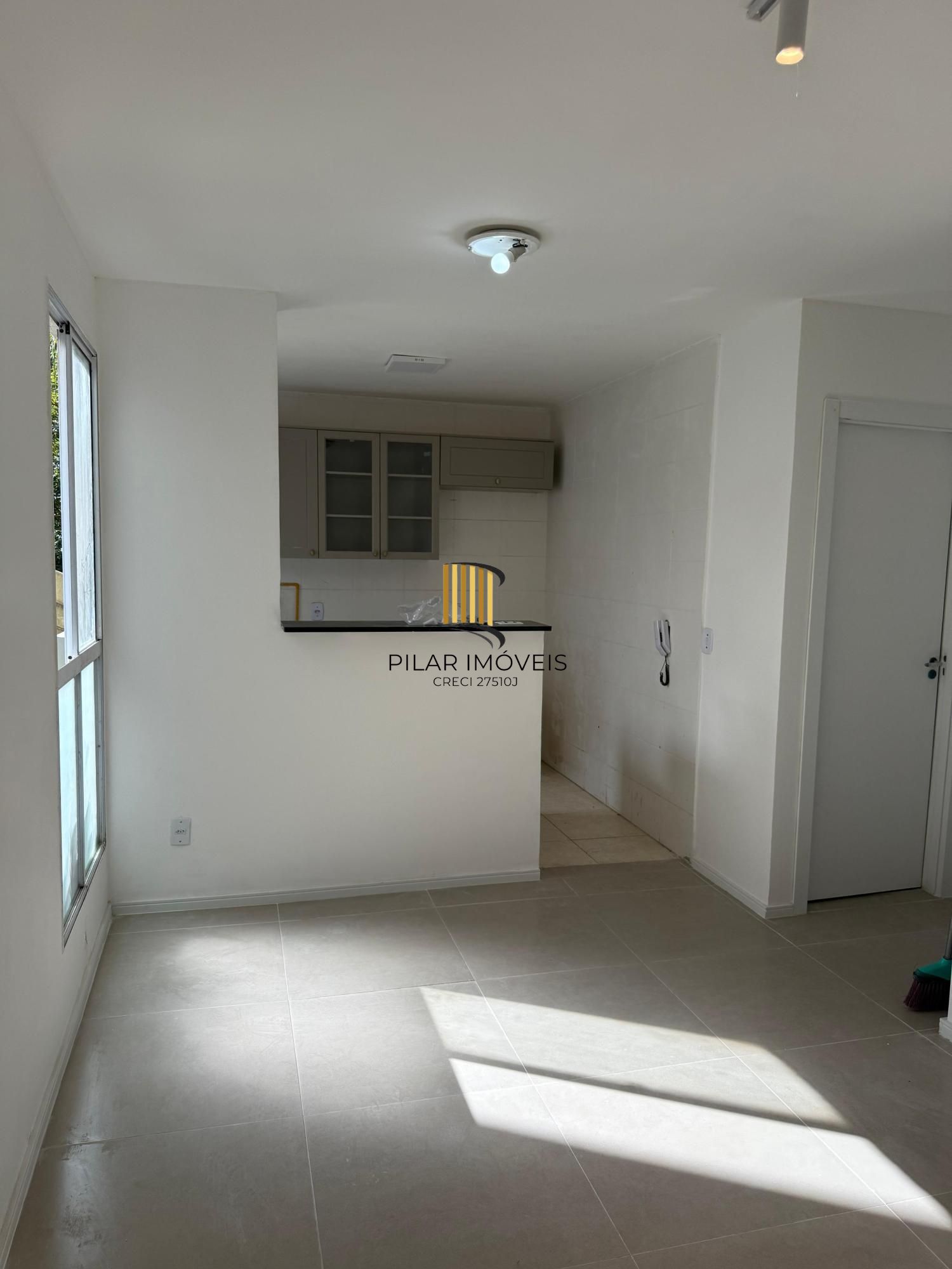 Apartamento 2 quartos, térreo, vaga fixa de garagem, zona sul-Poa. - Pilar Imóveis
