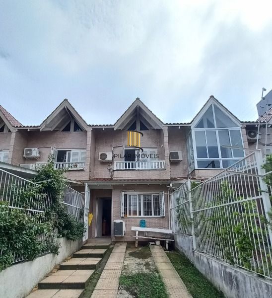Casa em Porto Alegre, no bairro Guarujá, com 2 dormitório(s), e 2 banheiros, à venda. - Pilar Imóveis