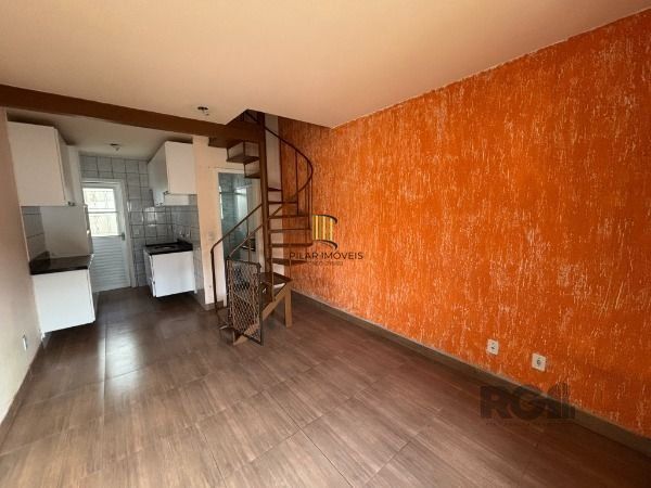 Casa Condominio em Porto Alegre, no bairro Vila Nova, com 3 dormitório(s), à venda.