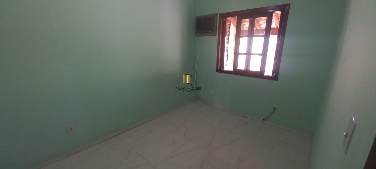 Casa 3 dormitórios no bairro Guarujá