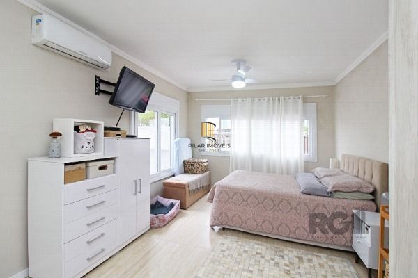 Casa em Porto Alegre, no bairro Hípica, com 3 dormitório(s), e 3 banheiros, à venda.