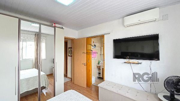 Casa Condominio em Porto Alegre, no bairro Hípica, com 3 dormitório(s), e 3 banheiros, à venda.