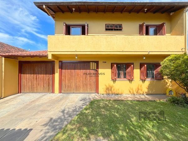 Casa 3 dormitórios no bairro Hípica