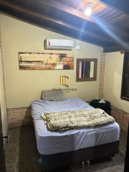 Casa 5 dormitórios no bairro Zona Norte