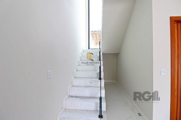 Casa Condominio em Porto Alegre, no bairro Ipanema, com 3 dormitório(s), à venda.