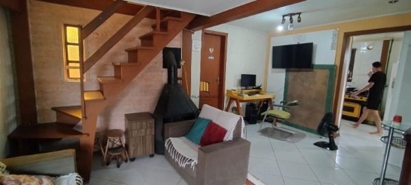 Casa 3 dormitórios no bairro Guarujá