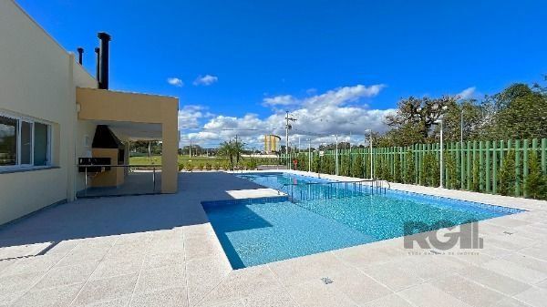 Casa Condominio em Porto Alegre, no bairro Hípica, com 3 dormitório(s), e 3 banheiros, à venda.