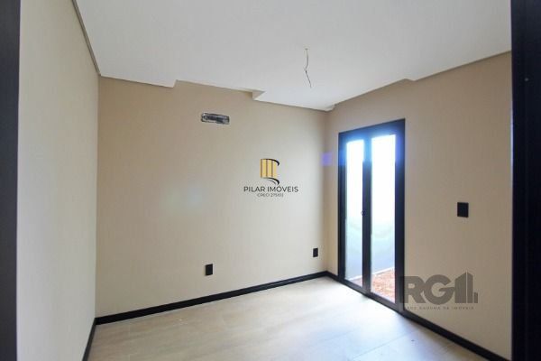 Casa em Porto Alegre, no bairro Hípica, com 3 dormitório(s), e 3 banheiros, à venda.