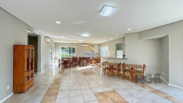 Casa Condominio em Porto Alegre, no bairro Vila Nova, com 3 dormitório(s), e 3 banheiros, à venda.