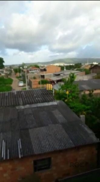 Casa em Porto Alegre, no bairro Hípica, com 2 dormitório(s), e 2 banheiros, à venda.