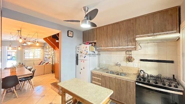 Casa Condominio em Porto Alegre, no bairro Cavalhada, com 3 dormitório(s), e 3 banheiros, à venda.
