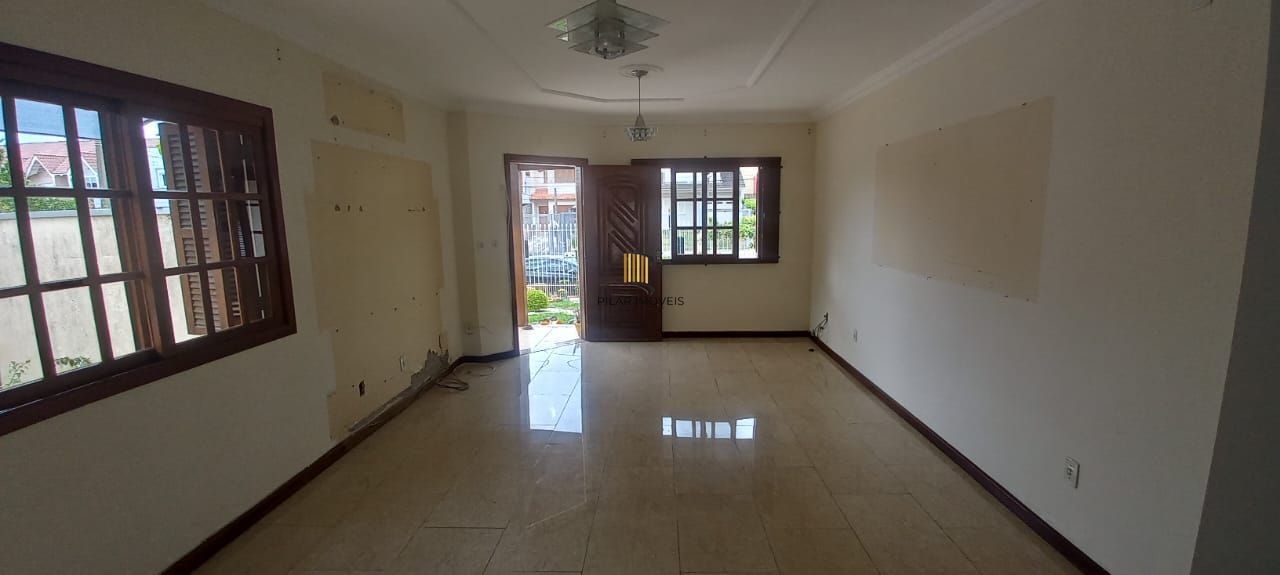 Casa 3 dormitórios no bairro Guarujá