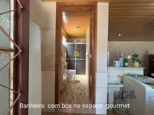 Casa 3 dormitórios no bairro Camaquã