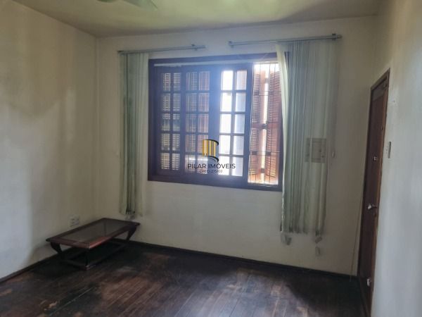 Casa 4 dormitórios no bairro Camaquã