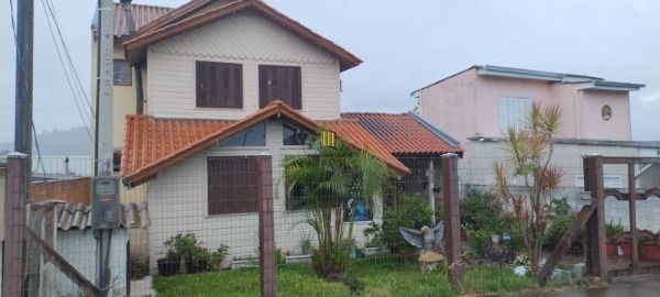 Casa 3 dormitórios no bairro Guarujá - Pilar Imóveis