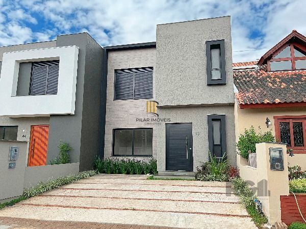 Casa Condominio em Porto Alegre, no bairro Hípica, com 3 dormitório(s), e 3 banheiros, à venda.