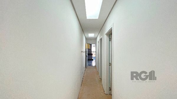 Casa Condominio em Porto Alegre, no bairro Hípica, com 3 dormitório(s), e 3 banheiros, à venda.