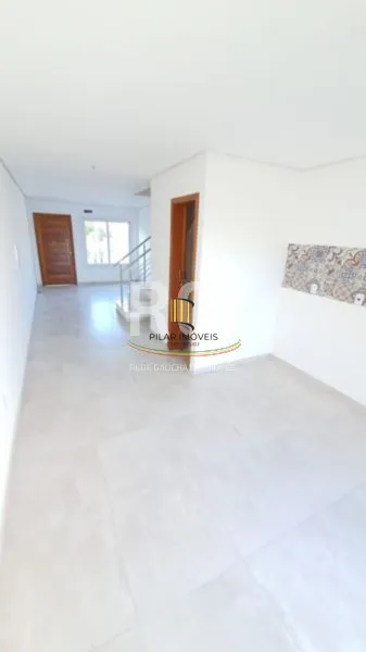 Casa 3 dormitórios no bairro Guarujá