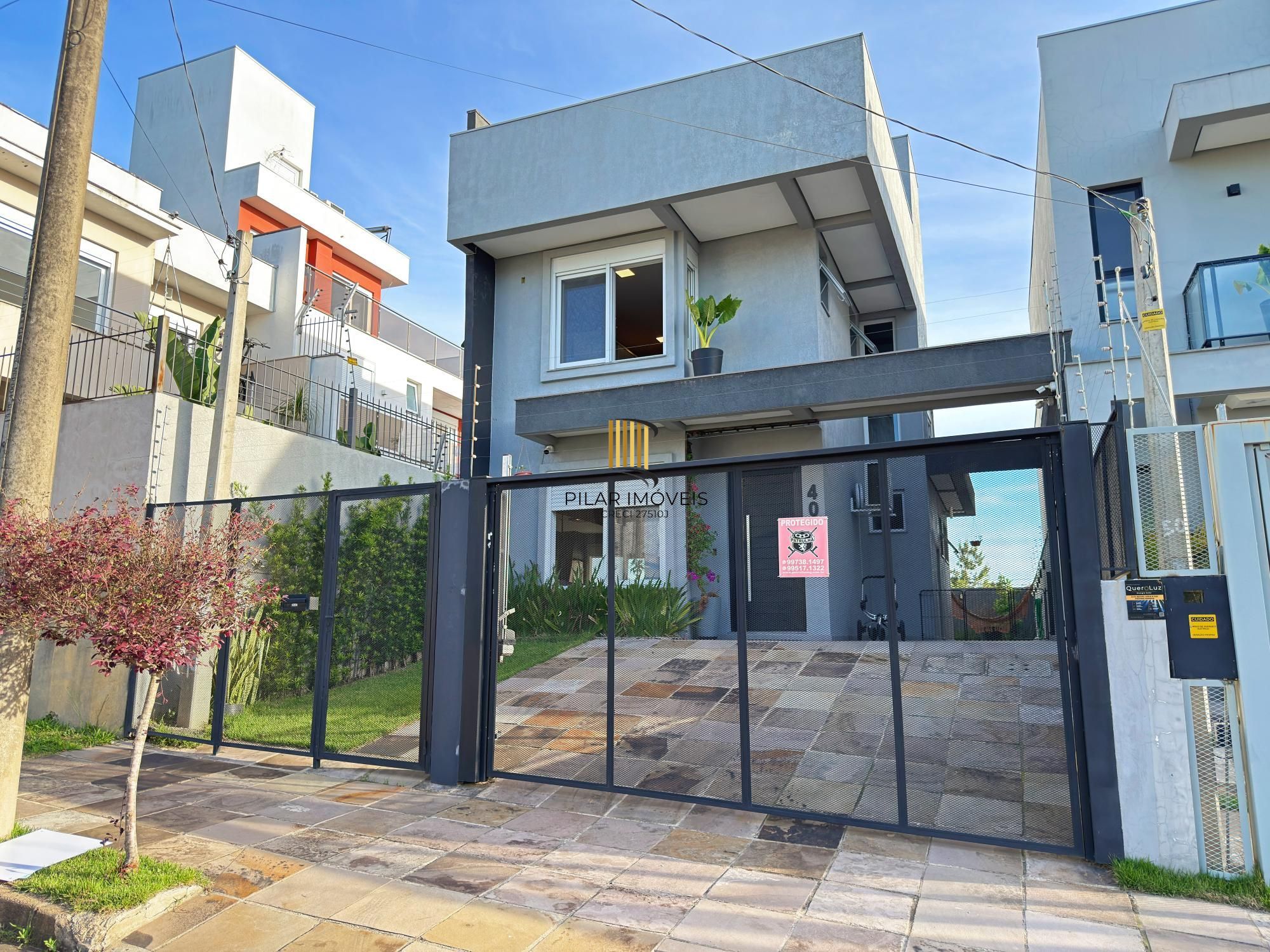 Casa moderna com 3 dormitórios com pátio grande e vista para o Rio Guaíba! - Pilar Imóveis