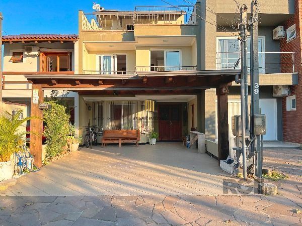 Casa em Porto Alegre, no bairro Hípica, com 3 dormitório(s), e 3 banheiros, à venda. - Pilar Imóveis