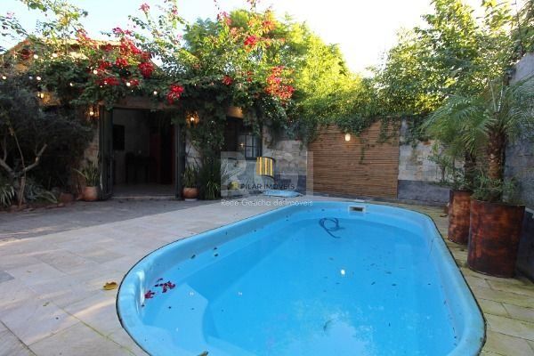 Casa Condominio em Porto Alegre, no bairro Ipanema, com 3 dormitório(s), e 3 banheiros, à venda.