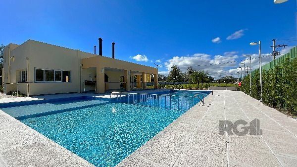 Casa Condominio em Porto Alegre, no bairro Hípica, com 3 dormitório(s), e 3 banheiros, à venda.