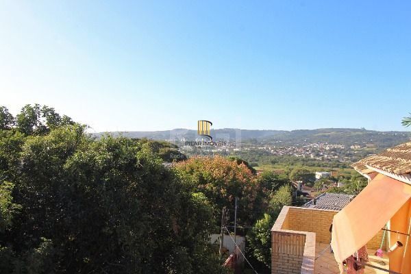 Casa Condominio em Porto Alegre, no bairro Ipanema, com 3 dormitório(s), e 3 banheiros, à venda.