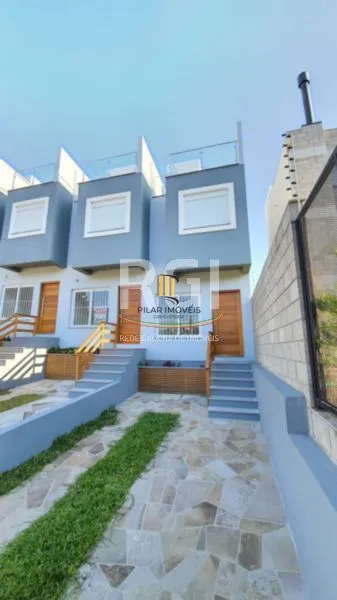 Casa 3 dormitórios no bairro Guarujá