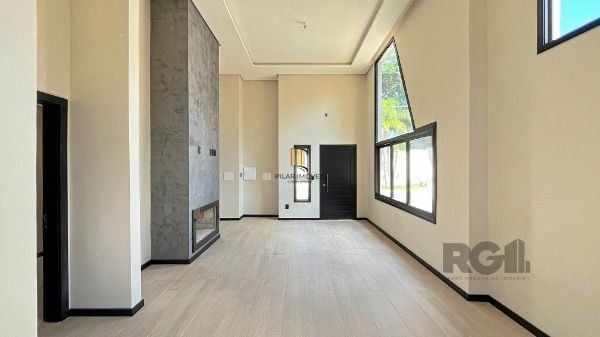 Casa em Porto Alegre, no bairro Hípica, com 3 dormitório(s), e 3 banheiros, à venda.