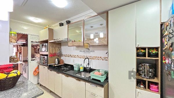 Casa Condominio em Porto Alegre, no bairro Hípica, com 3 dormitório(s), e 3 banheiros, à venda.