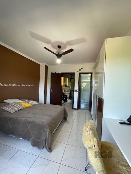 Casa em Porto Alegre, no bairro Hípica, com 3 dormitório(s), e 3 banheiros, à venda.