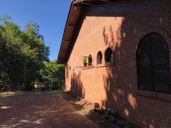 Sítio em Porto Alegre, no bairro Vila Nova, com 3 dormitório(s), à venda.