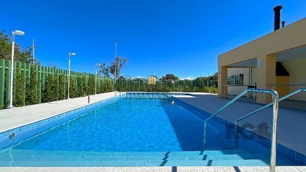 Casa Condominio em Porto Alegre, no bairro Hípica, com 3 dormitório(s), e 3 banheiros, à venda.