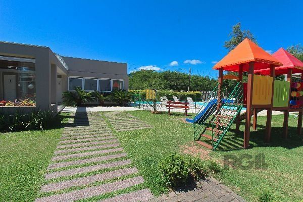 Casa Condominio em Porto Alegre, no bairro Hípica, com 3 dormitório(s), e 3 banheiros, à venda.