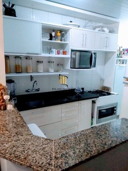 Casa em Porto Alegre, no bairro Hípica, com 3 dormitório(s), e 3 banheiros, à venda.