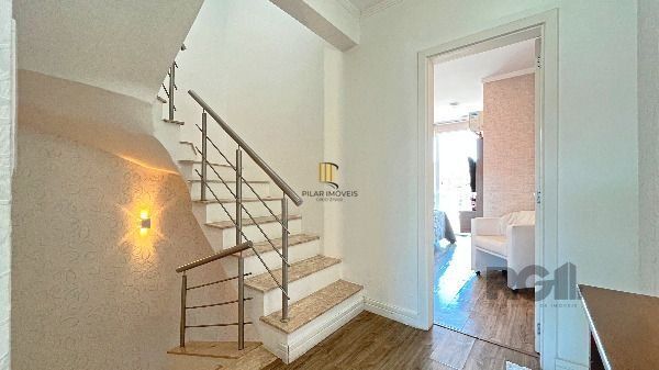 Casa em Porto Alegre, no bairro Hípica, com 3 dormitório(s), e 3 banheiros, à venda.