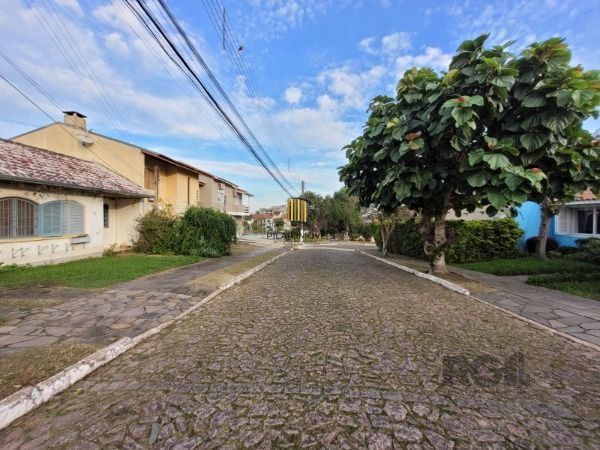Casa Condominio em Porto Alegre, no bairro Hípica, com 3 dormitório(s), e 3 banheiros, à venda.