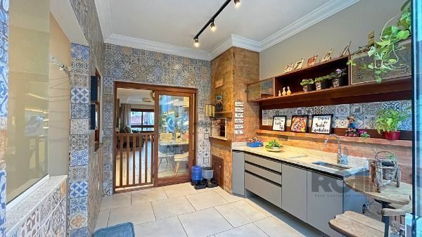 Casa 3 dormitórios no bairro Hípica